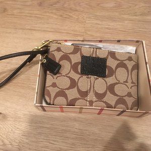 NWT Coach signature wristlet in gift box